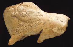 Bison with turned head, fragmentary spearthrower, from
La Madeleine, France, ca. 12,000 BCE. Reindeer horn, 4 long.