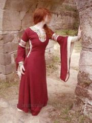 An Extremely tight fitting surcote worn by medieval women.
