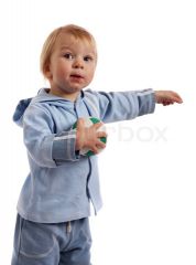http://www.colourbox.com/preview/2893441-501504-little-boy-holding-soccer-ball-and-point-out.jpg