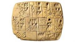a system of writing first developed by the ancient Sumerians