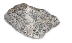 Which layer in the earth has a composition similar to the granite shown in this photograph?