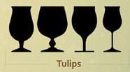 A stemmed glass, obviously tulip-shaped, wherein the top of the glass pushes out a bit to form a lip in order to capture the head and the body is bulbous. Scotch Ales are often served in a "thistle glass," which is a modified tulip glass that rese...