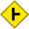 Watch for side road traffic to the right