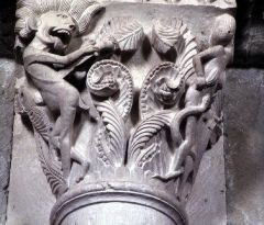 What are historiated Romanesque capitals?