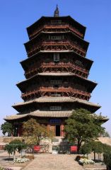 A multistoried Chinese tower, usually associated with a Buddhist temple, having a multiplicity of projecting eaves.