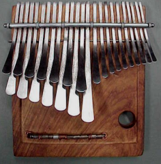 lamellophone(type of ideophone). Zimbabwe. played by plucking with thumbs.