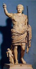Emperor Augustus, 25 bce, Early Empire
could have been made after death, or while living, 
idealized, either by others because he was great or by himself because was egotistical.
barefoot, supported by signs of athena, mythological scene on his breastp