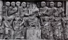 Distribution of Largess, Late Empire, 300 CE
A relief carving from arch of Constantine
shows a new, less classical style of form depiction, much more static, chunky, frozen in a moment, no gesture