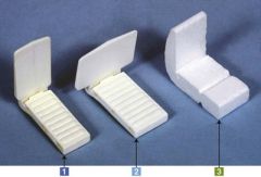 1Holds film for anterior teeth projection—Plastic that can be sterilized
2Holds film for posterior teeth projection—Plastic that can be sterilized
3Holds film for anterior and posterior projection—Disposable styrofoam
Slot holds film in place