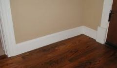 A molding that conceals the joint between an interior wall and the floor. Also called mopboard.