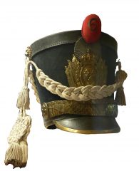 a stiff military hat in the shape of a tube, usually with a plume. 
