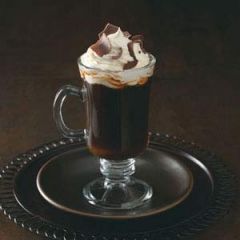 
Coffee Glass, Coaster, Whipped Cream, Nutmeg, Cherry, and Straws

1/2 oz. Brandy
1/2 oz. Kahlua
Fill With Hot Coffee