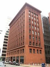 a very tall building of many stories.
 
Ex: Louis Sullivan---Wainwright Building