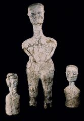  *Figures, from Ain Ghazal, Jordan. 


C. 7000-6000 BCE.  Clay plaster with cowrie shell, bitumen, and paint,


height approx. 35” (90cm)


Applied wet plaster to reed – and cord frames in human shape, the eyes were inset cowerie shell...