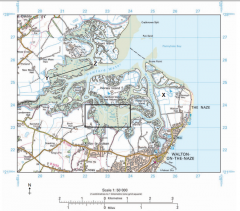 Grid squares 2223 and 2323 are outlined on the map. Describe the coastal environment shown in these grid squares (2)