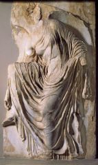 Nike Fastening her sandal, from parapet of the Temple of Athena Nike, Akropolis, Athens, Greek classical relief sculpture, 5th century, BC