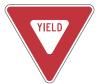 This sign means?
A) Slow down, completely stop if required, yield right-of-way traffic.
B) Completely stop at sign and yield right-of-way traffic.
C) Slow down for an approaching intersection.
D) Wrong way, do not enter.