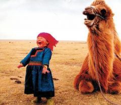 Past Participle
 Laughed 
The girl laughed with the camel.