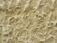 (n) roughcast: a coarse lime and cement slurry that is troweled, not painted, on the exterior surfaces of walls or buildings. Seen on Tudor-style homes.